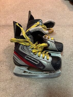 Bauer Silver Black Red Youth Hockey Skates with Yellow Laces
